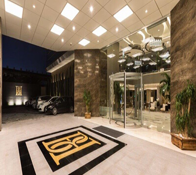 Monaco Dark Brown Travertine Hotel Entrance Cladding